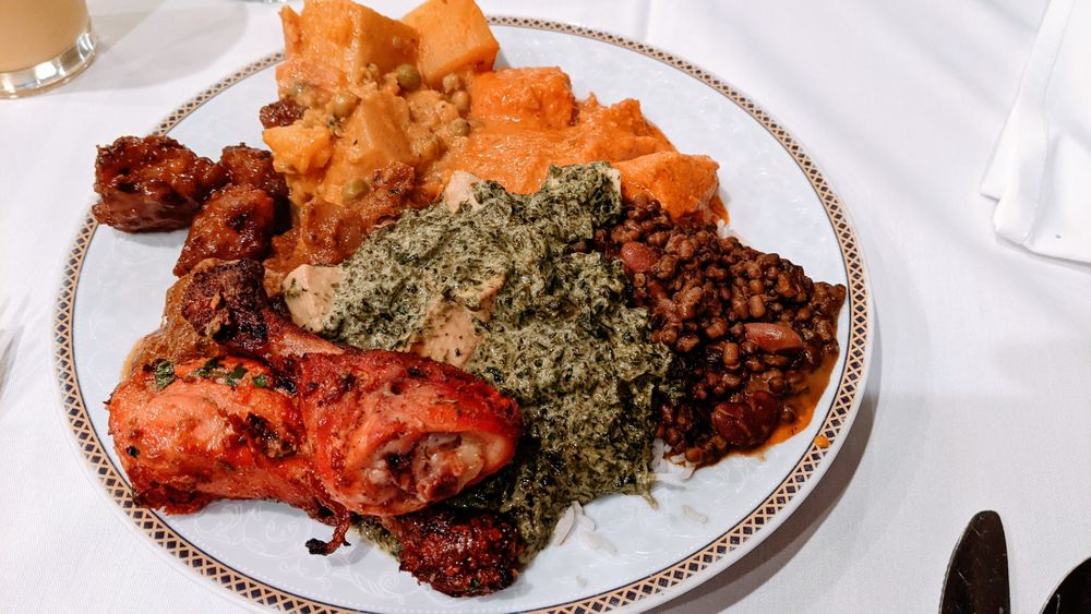 Narin's Bombay Brasserie signature dishes Tandoori ChickenLamb VindalooGarlic Naan